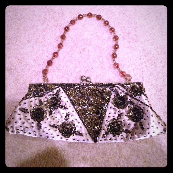 Gold and black sequence purse.
