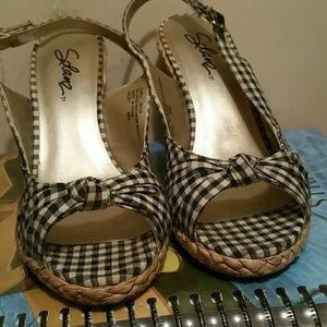 Black and white gingham wedge heels.
