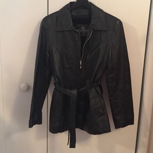 Mid length black leather coat