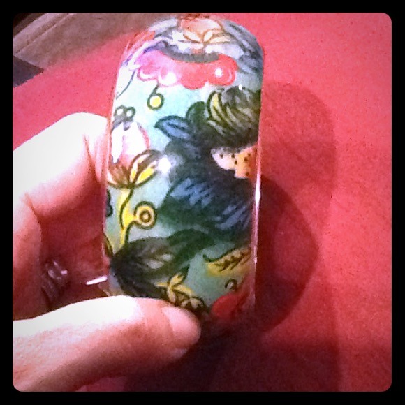 Large floral bangle bracelet.