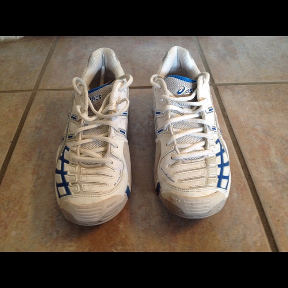 White and blue asics tennis shoes