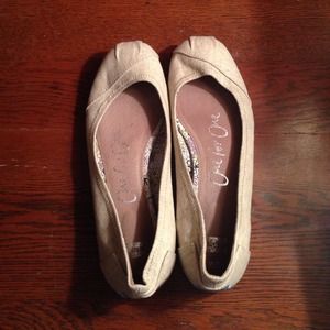 Tom's tan flats