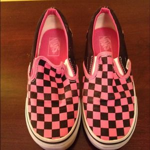 Black and pink slip on Vans