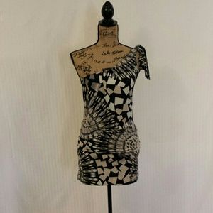 VERY cute mini dress. Neutral colors