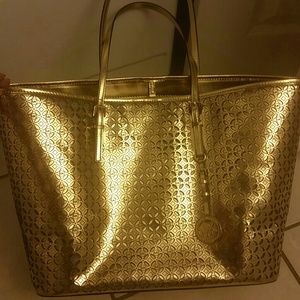 Traded brand new with tag gold mk bag