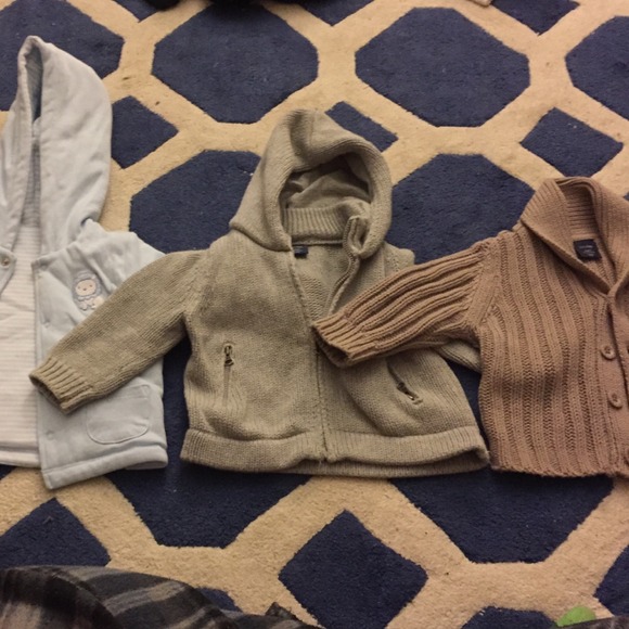 Three baby boy sweaters with dark brown boots