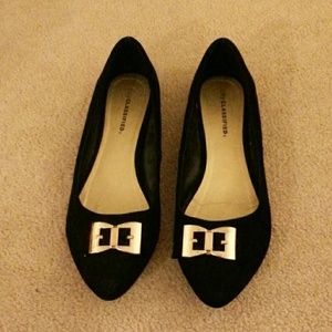 Black and gold flats