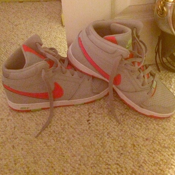 Gray and pink Nikes