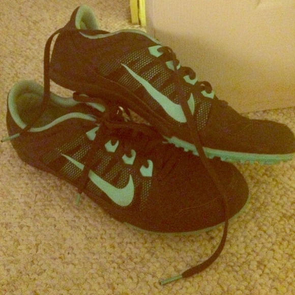Teal and black track shoes or cross country shoes