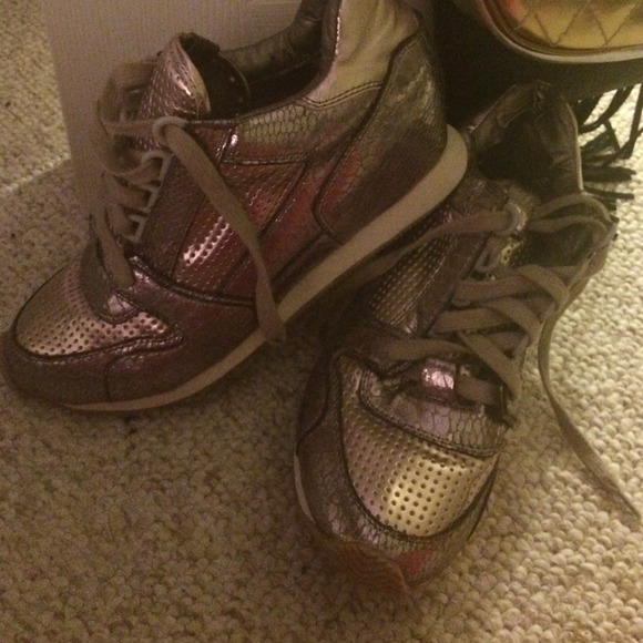 Metallic Gold wedge tennis shoes.
