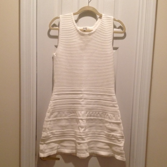 White cotton sleeveless dress.