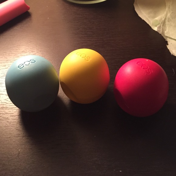Three EOS chapsticks