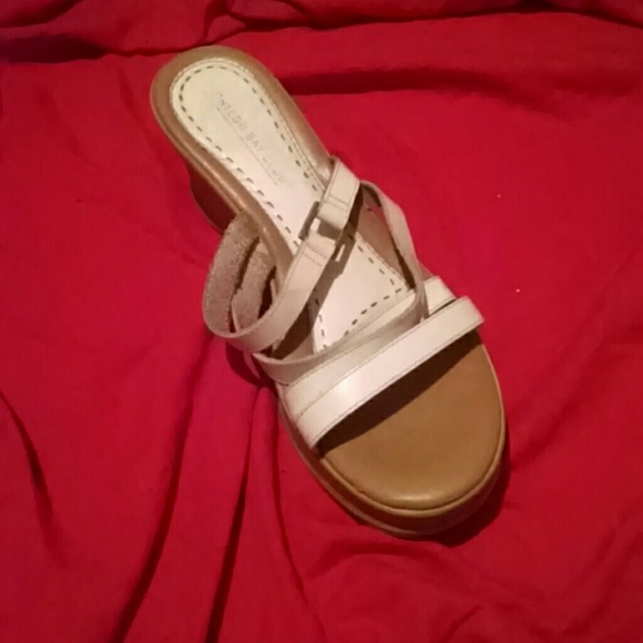 White & tan wedge shoe