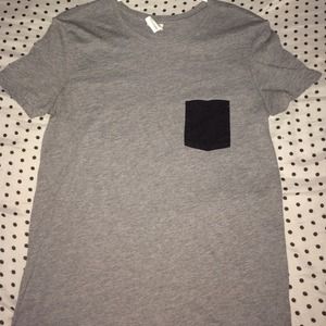 A top with a cute black pocket