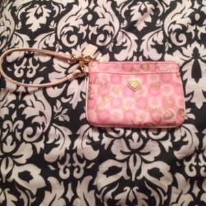 pink and gold coach wristlet