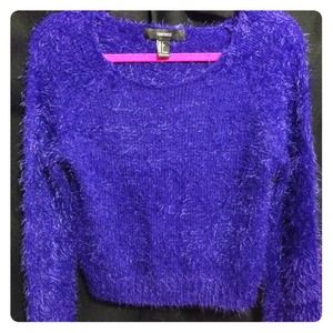 Fuzzy blue crop top.