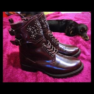 Maroon jeweled boots.