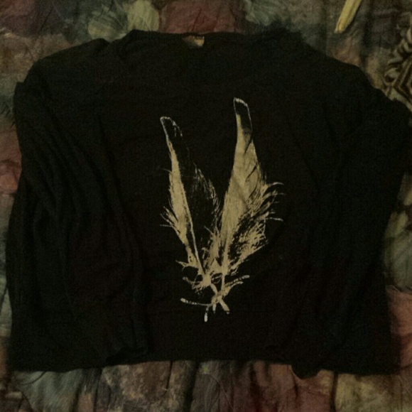 Sweater with feathers on front