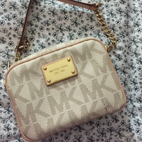 Michael kors cross body logo bag. Barely used.