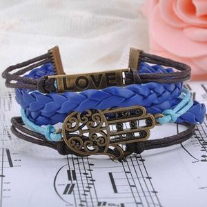 Leather wrap charm bracelet "good fortune"