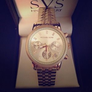 Michael Kors Chronograph Gold bracelet watch.