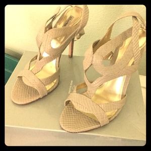 Charles David cream colored  snake skinned heels.