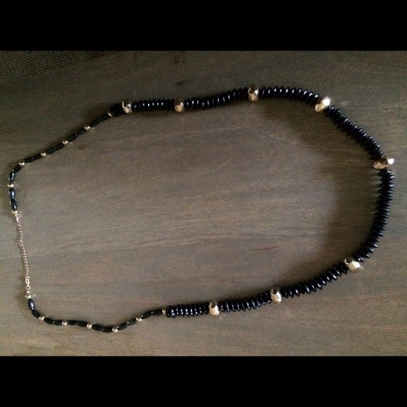 Brand new never worn black necklace- 22.5" long.