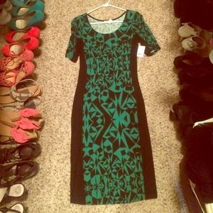 Great longer fitted dress! Cute design.