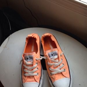 Neon orange converse