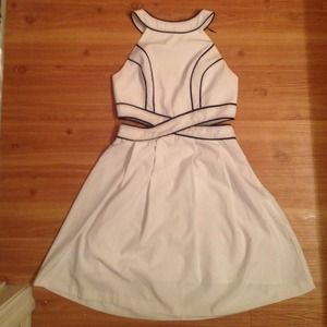 White cut-put dress with black trim