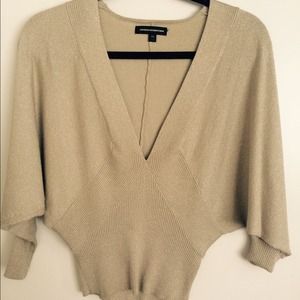 Sparkly gold sweater top. Size xs.
