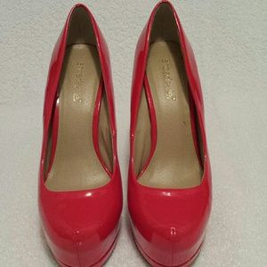 Red high heel pumps