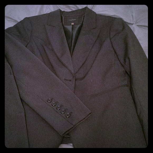 The limited black pinstripe business suit