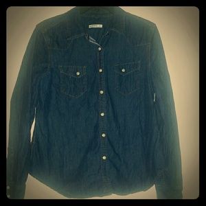 A demin snap button shirt