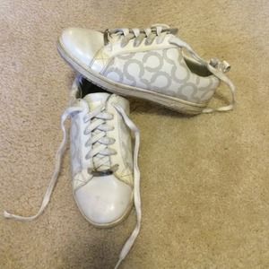 White coach shoes.
