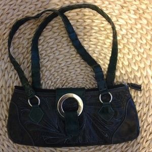 Leaders in leather embroidered purse.