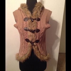 Sleeveless sweater with faux fur🐻