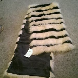 Black and tan faux fur wrap. NWT