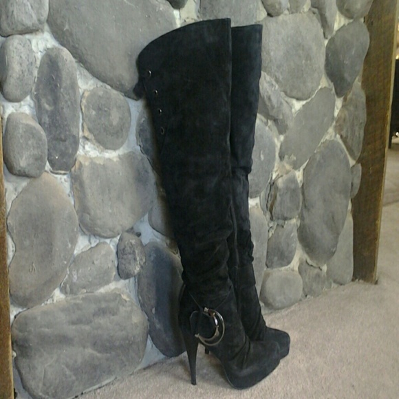 Black leather thigh high boots