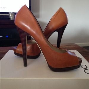 Beautiful cognac peep toe pumps!