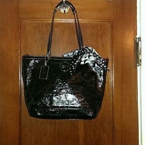 Medium sized black Coach tote
