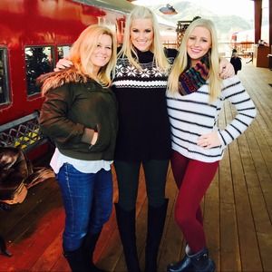 Black sweater with green tights