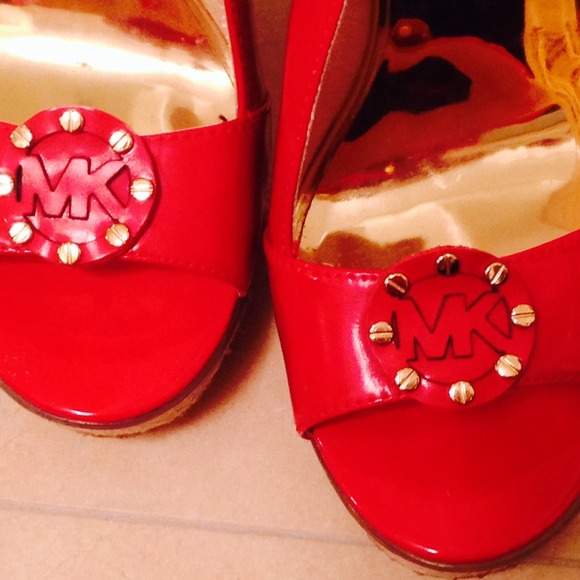 Michael Kors red patent leather wedges