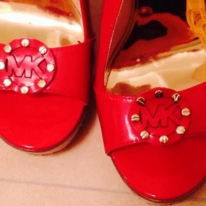 Michael Kors red patent leather wedges