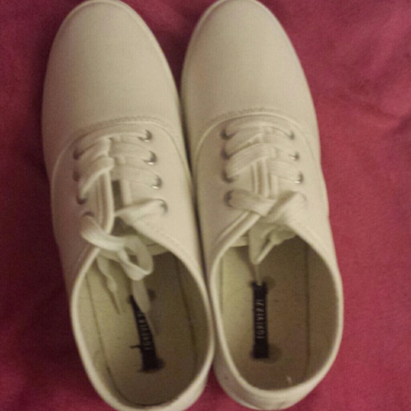 White laced sneakers