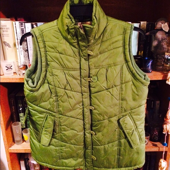 Green puffy vest.