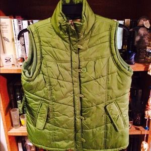 Green puffy vest.