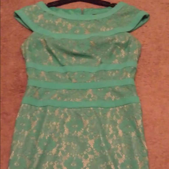 Mint lace dress with nude under slip.