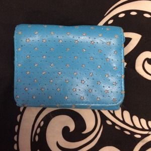 Blue wallet. With silver glitter stars