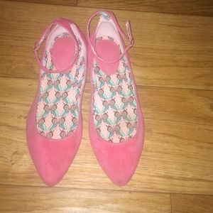 Pink ballet flats with ankle straps